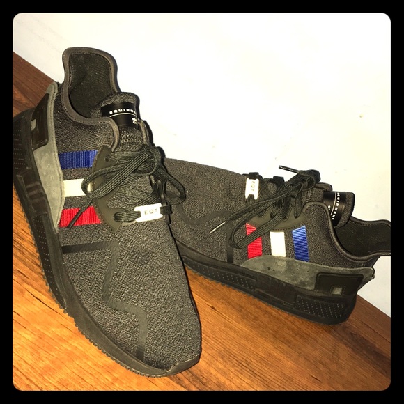 white adidas shoes with blue and red stripes